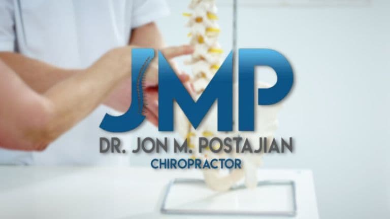 Dr. Jon Postajian chiropractic clinic logo over practitioner examining a spine model during patient consultation.