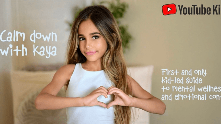 Kaya making a heart shape with her hands beside text promoting her YouTube Kids mental wellness channel.