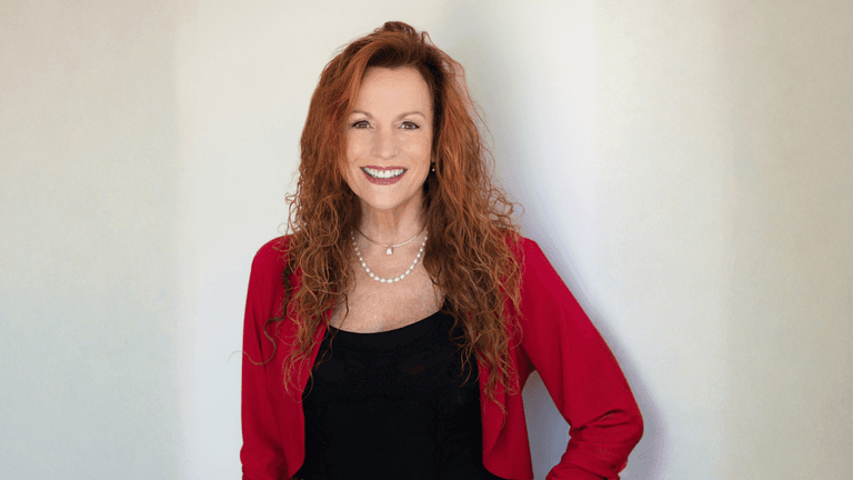 "Portrait of Nancy Prince, a pioneering real estate leader, exemplifying resilience, innovation, and adaptability in the industry."