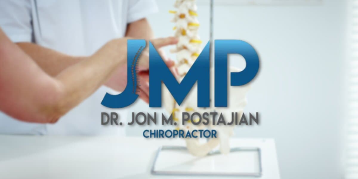 Dr. Jon Postajian chiropractic clinic logo over practitioner examining a spine model during patient consultation.